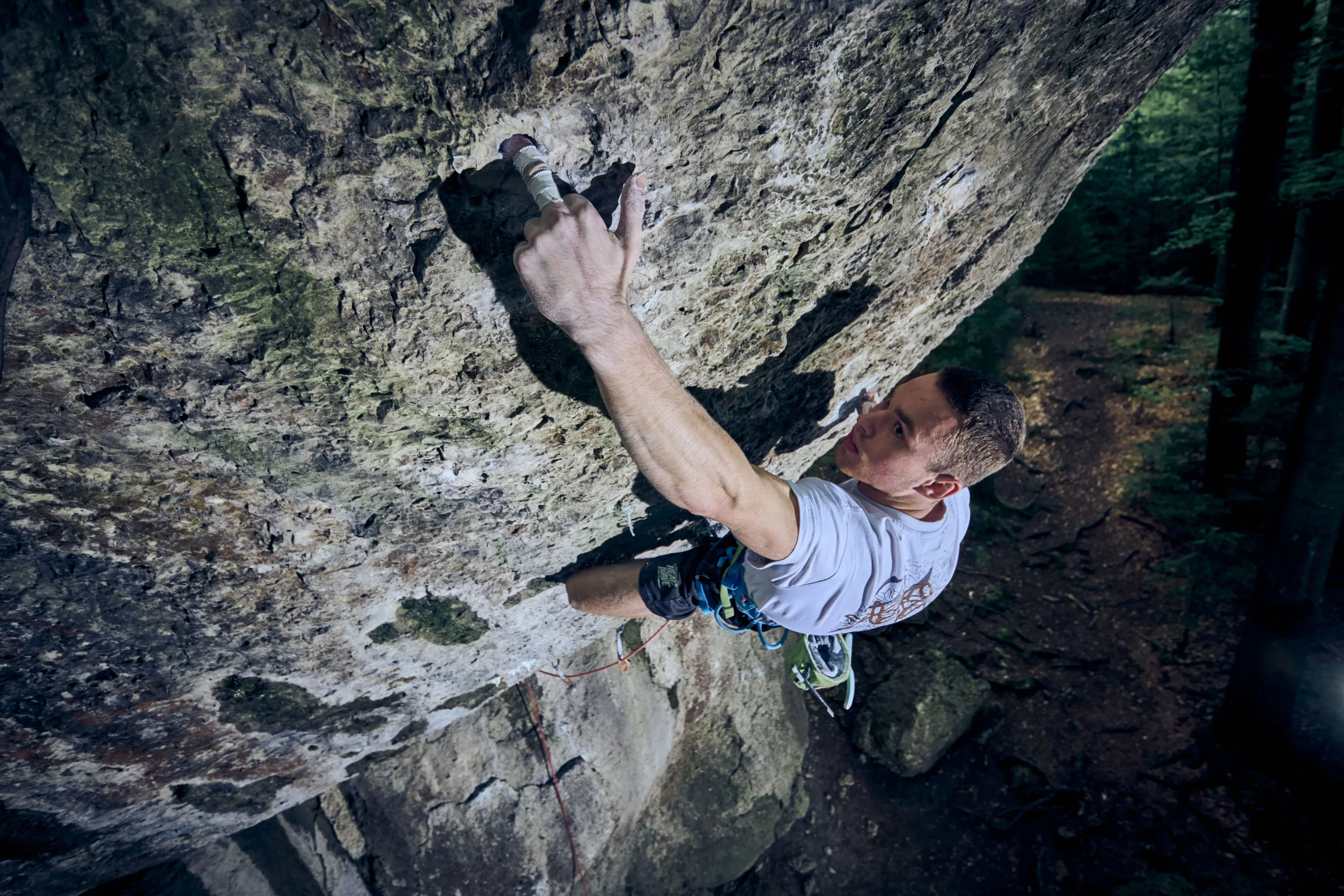 Polish climber Michał Korban shortly before finishing his ascent of Action Directe